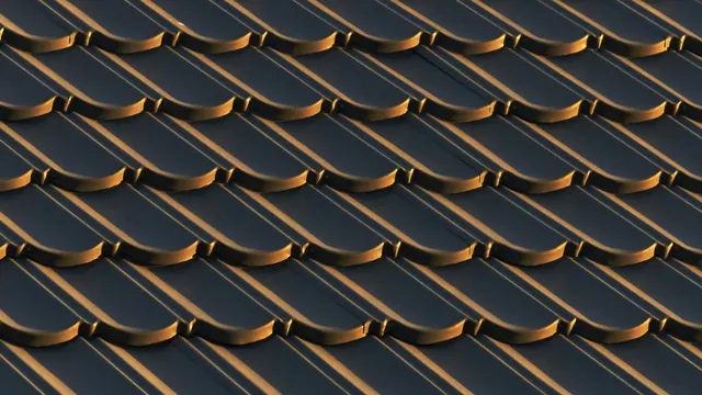 Close view of overlapping asphalt roof shingles laid in courses