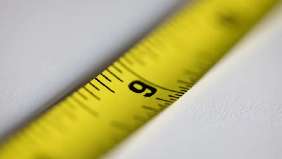Close view of the markings on a steel tape measure
